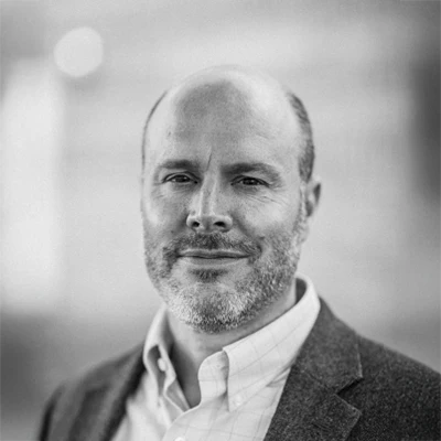 A headshot of Dr. Toby Weig, a chiropractor at Weig Chiropractic Center